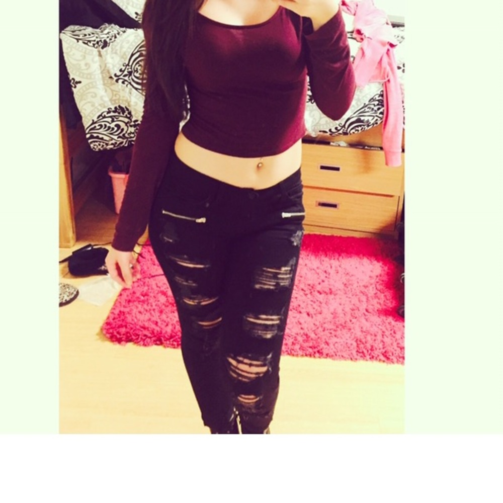 Black ripped jeans from ANGL